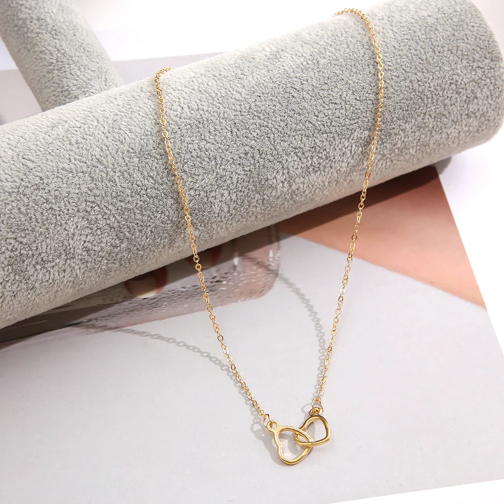 Collier Double Cœur Creux – Élégance Simple et Romantique pour Femmes